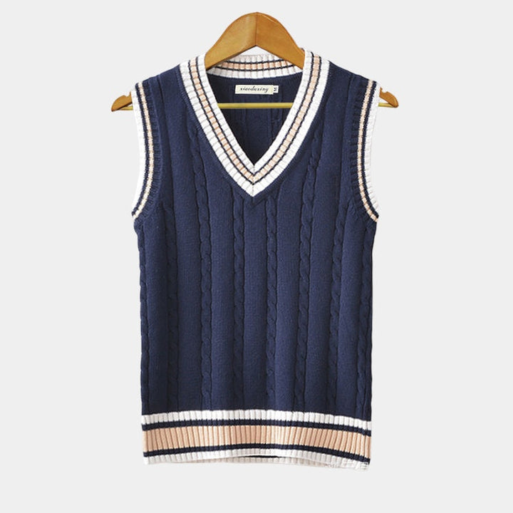Cable knit sleeveless sweater vest with V-neck trim