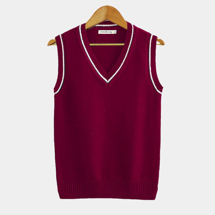 Cable knit sleeveless sweater vest with V-neck trim