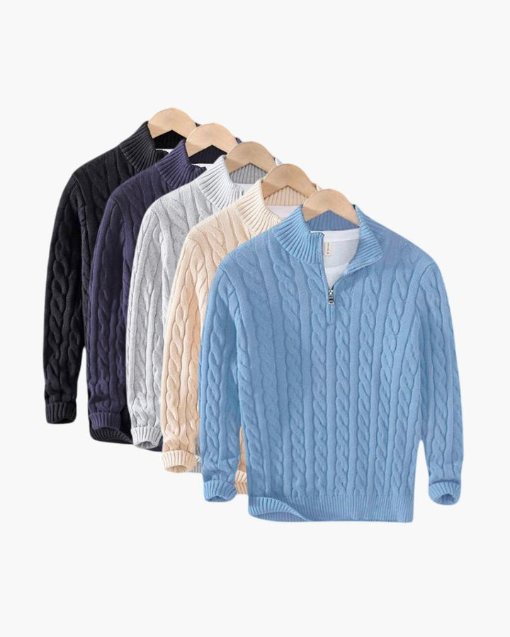 Men's blue cable knit quarter-zip sweater with mock neck and long sleeves