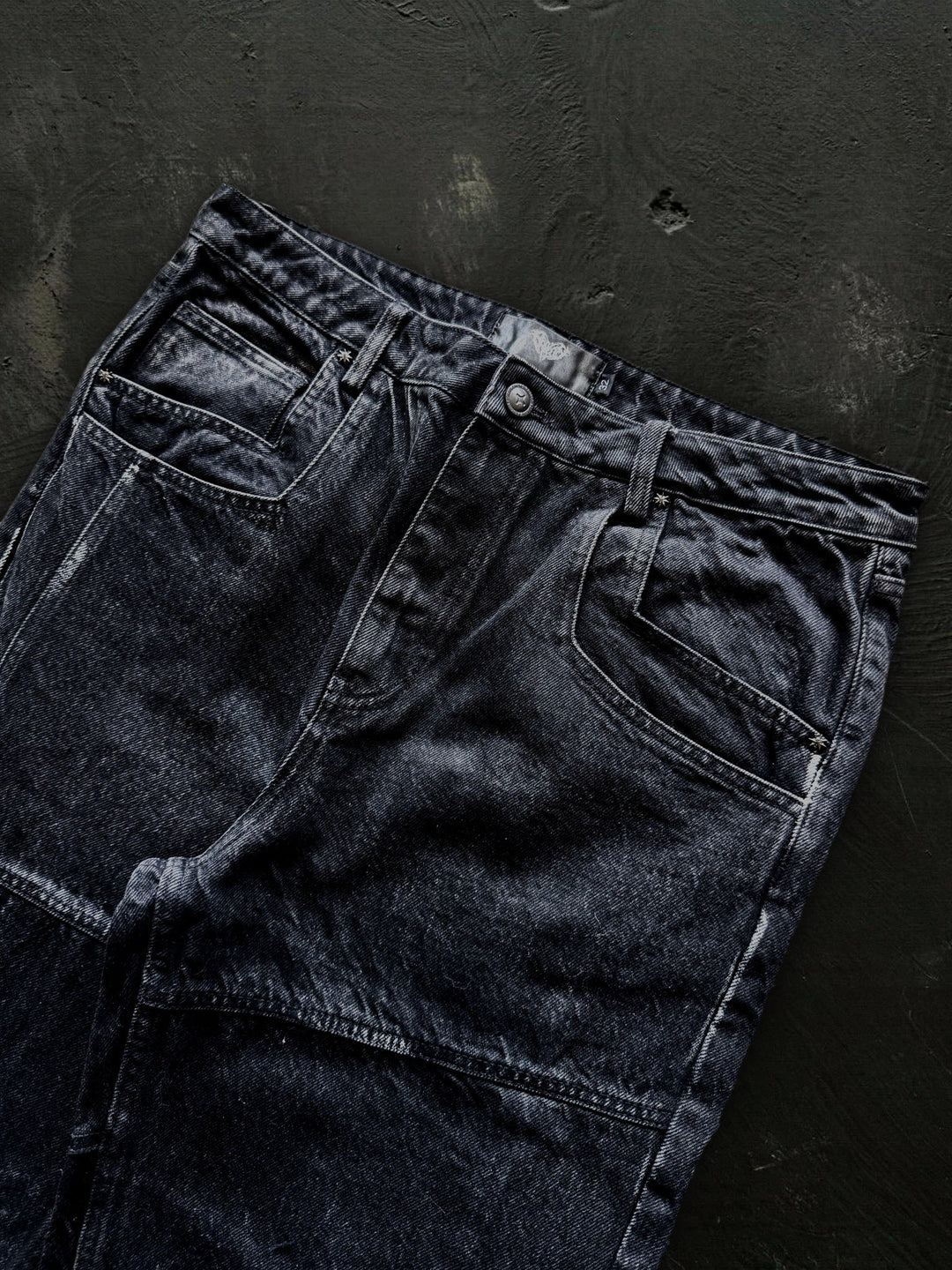 Women's dark black flared jeans with panel seams and patch pockets