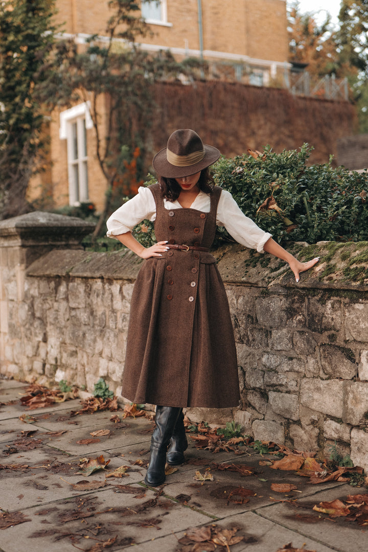 Women's brown herringbone pinafore midi dress with buttons and belt