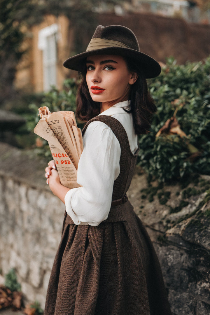 Women's brown herringbone pinafore midi dress with buttons and belt