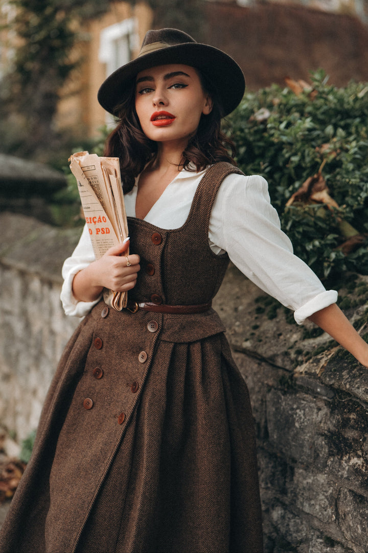 Women's brown herringbone pinafore midi dress with buttons and belt
