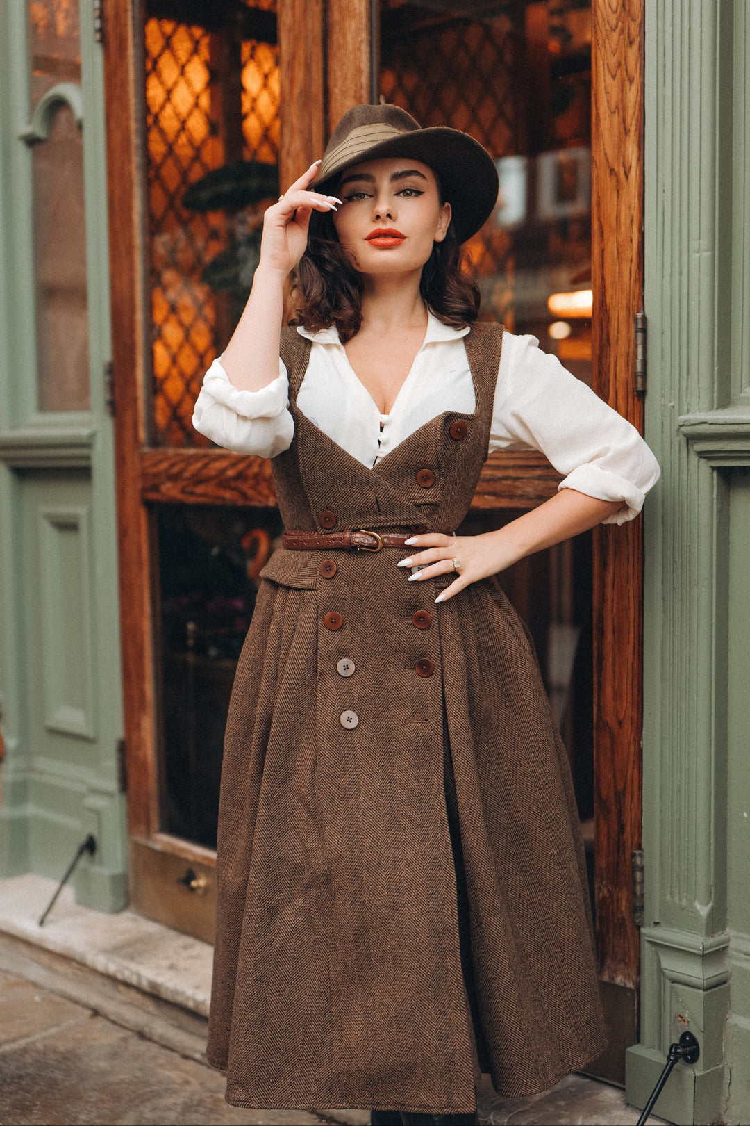 Women's brown herringbone pinafore midi dress with buttons and belt