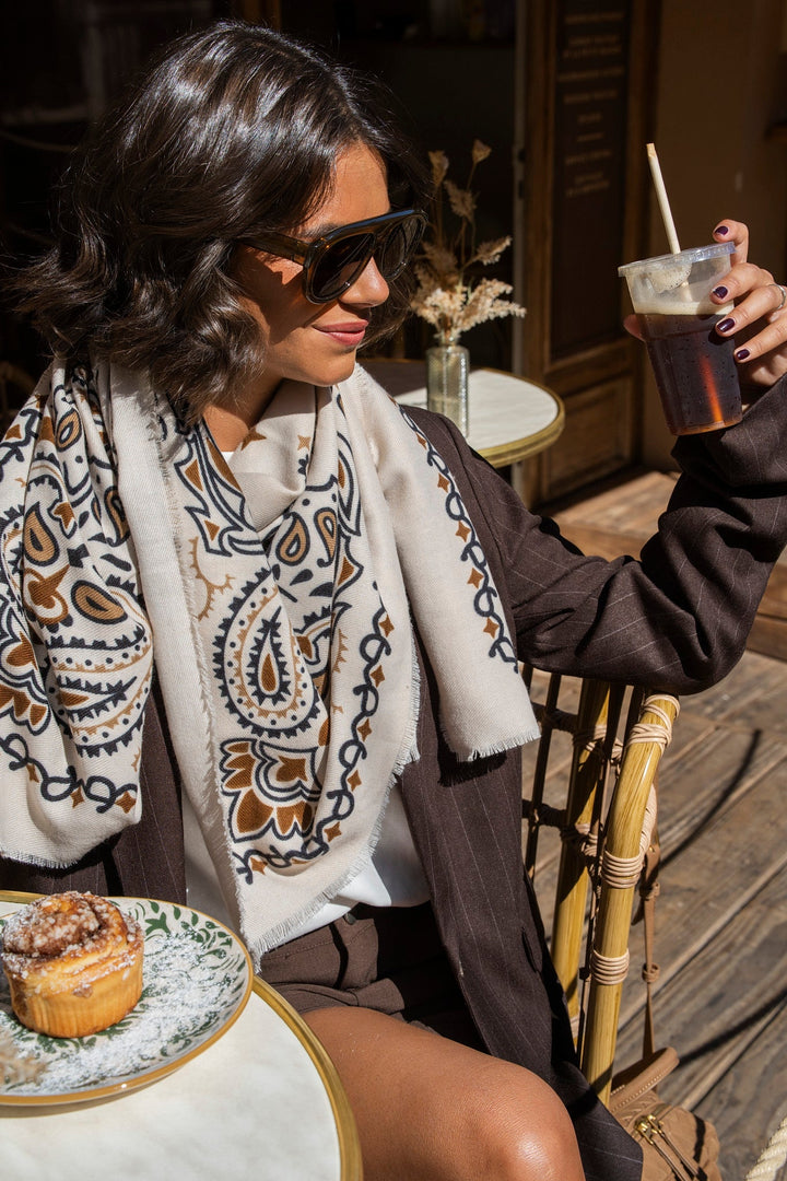 Women's cream paisley bandana scarf with brown and black print and fringed edges