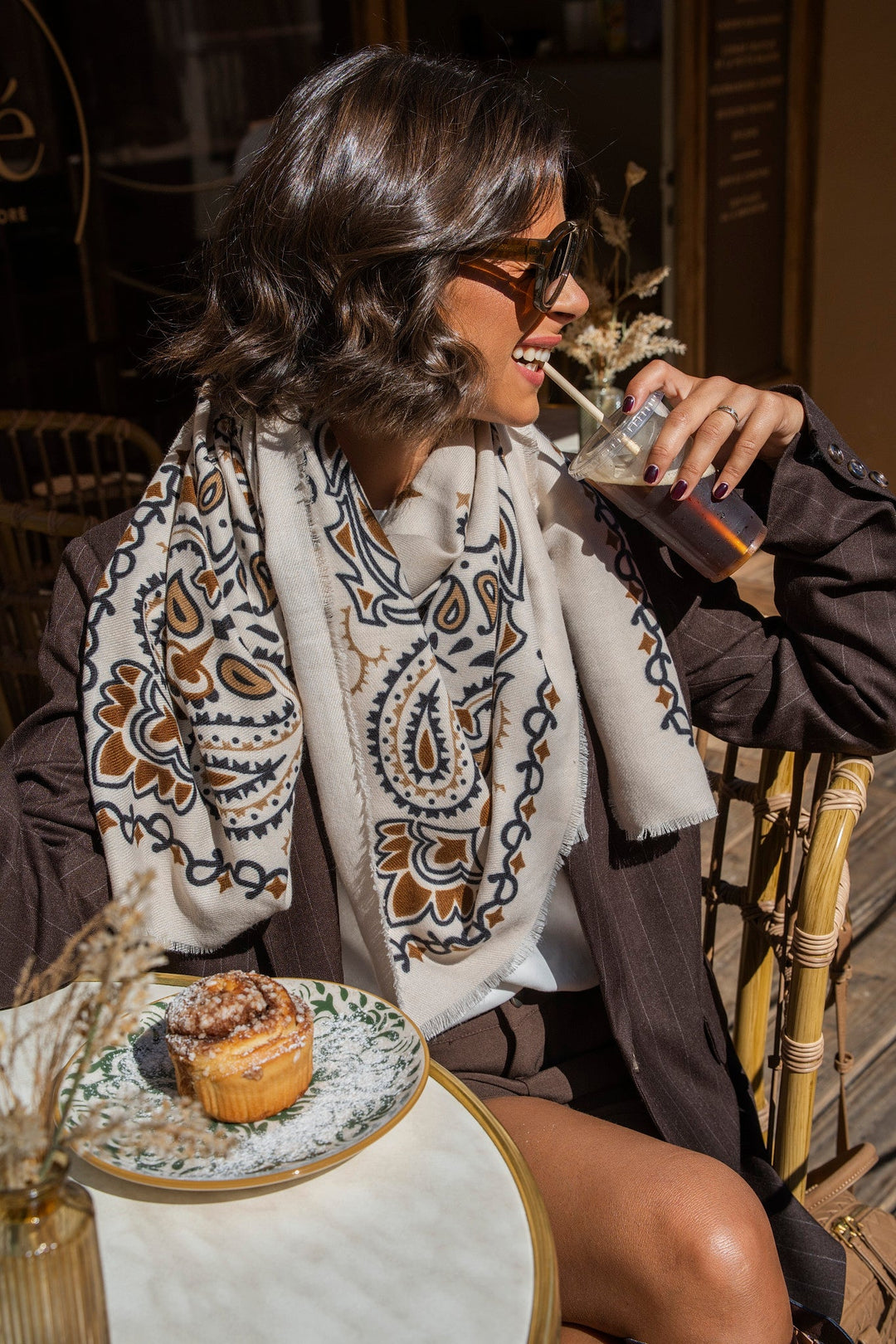 Women's cream paisley bandana scarf with brown and black print and fringed edges