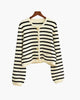 Women's black and cream striped cropped cardigan with buttons and front pockets