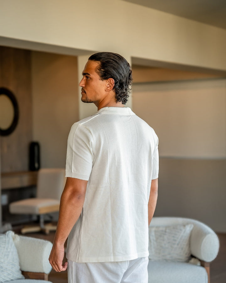 Men's white striped knit polo shirt with short sleeves