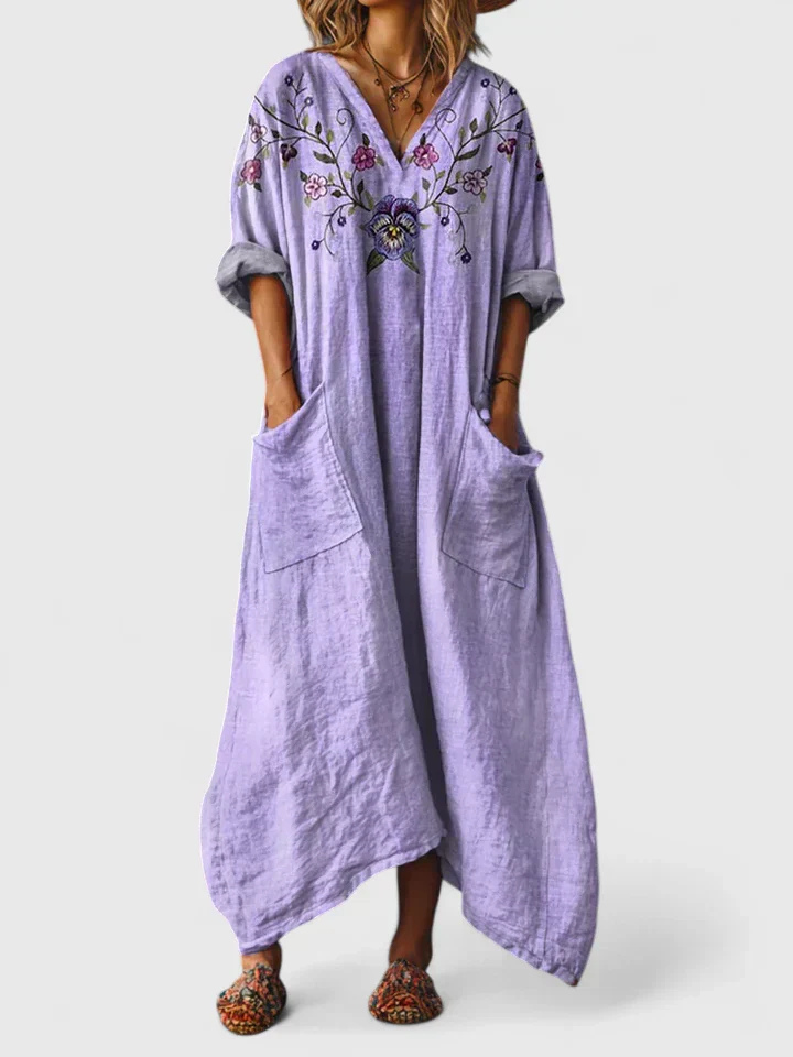 Women's boho floral print maxi dress with V-neckline, three-quarter sleeves and front pockets