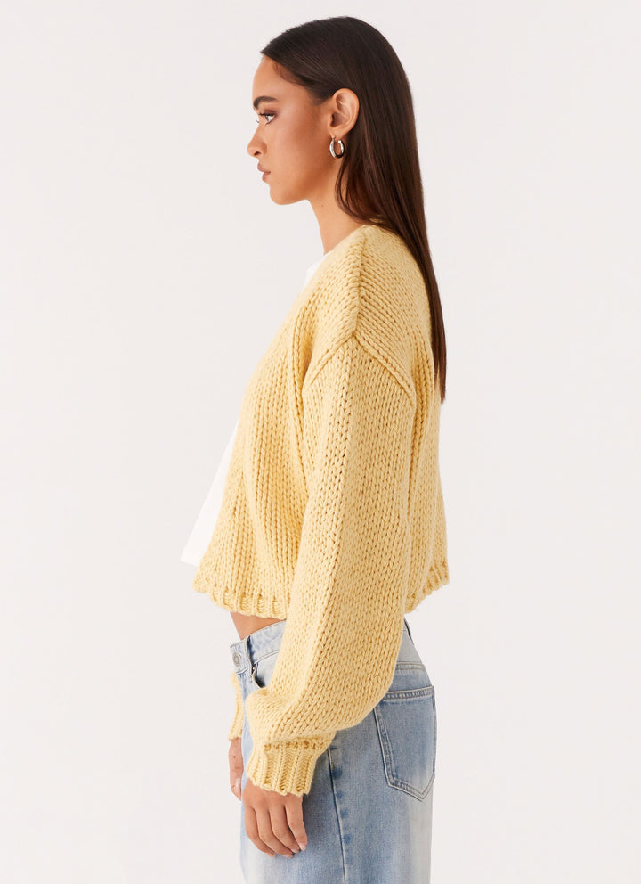 Women's yellow chunky knit cropped cardigan with long sleeves and open front