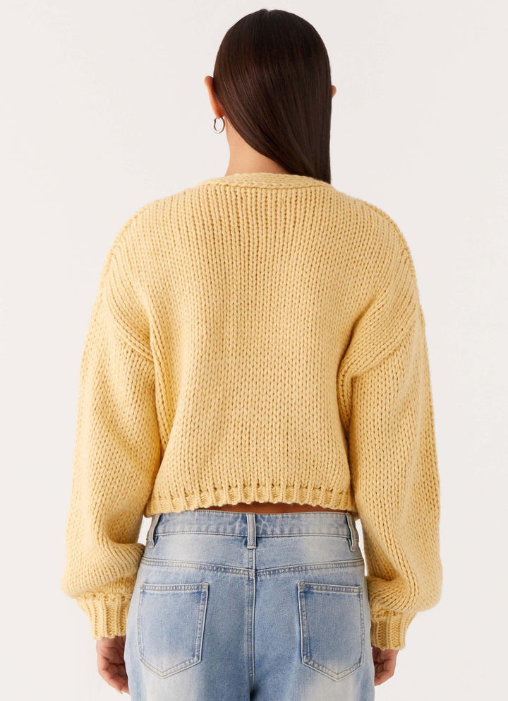 Women's yellow chunky knit cropped cardigan with long sleeves and open front