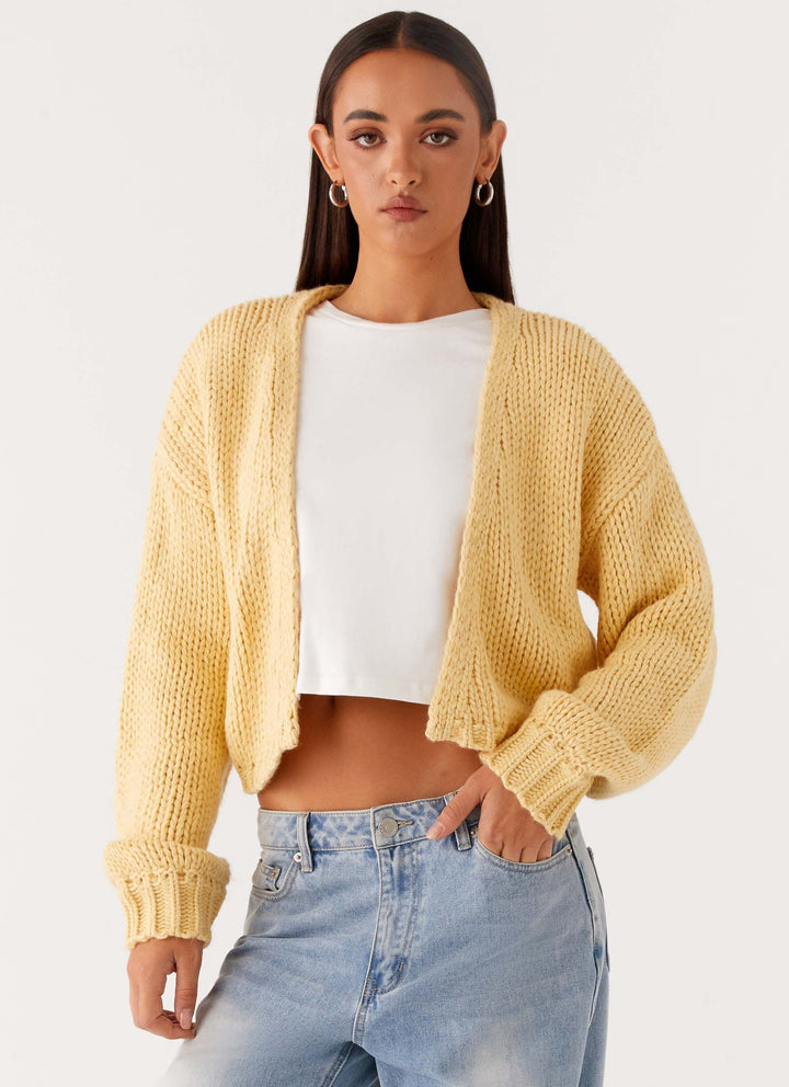 Women's yellow chunky knit cropped cardigan with long sleeves and open front