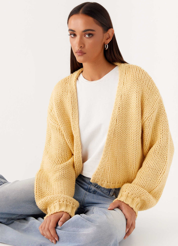 Women's yellow chunky knit cropped cardigan with long sleeves and open front