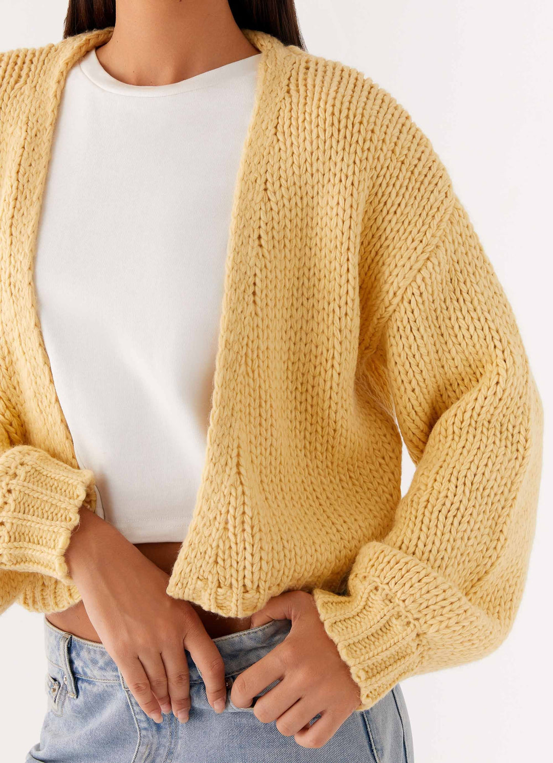 Women's yellow chunky knit cropped cardigan with long sleeves and open front