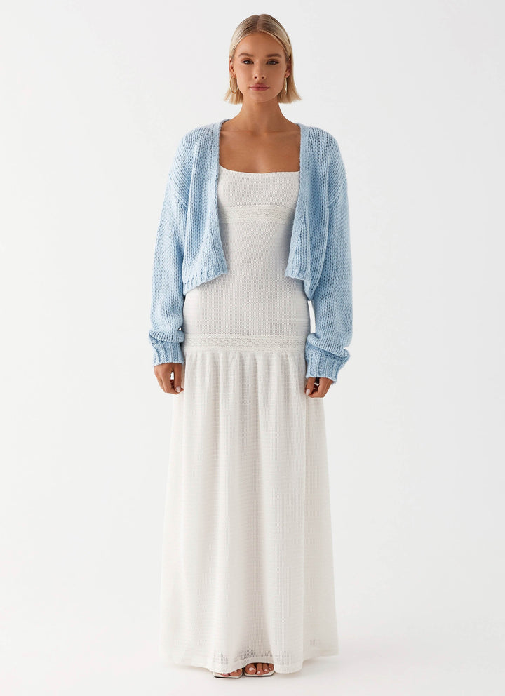 Women's pale blue chunky knit cardigan with open front and long sleeves