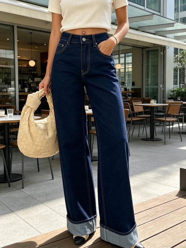Women's dark blue high waist wide leg jeans with rolled cuffs