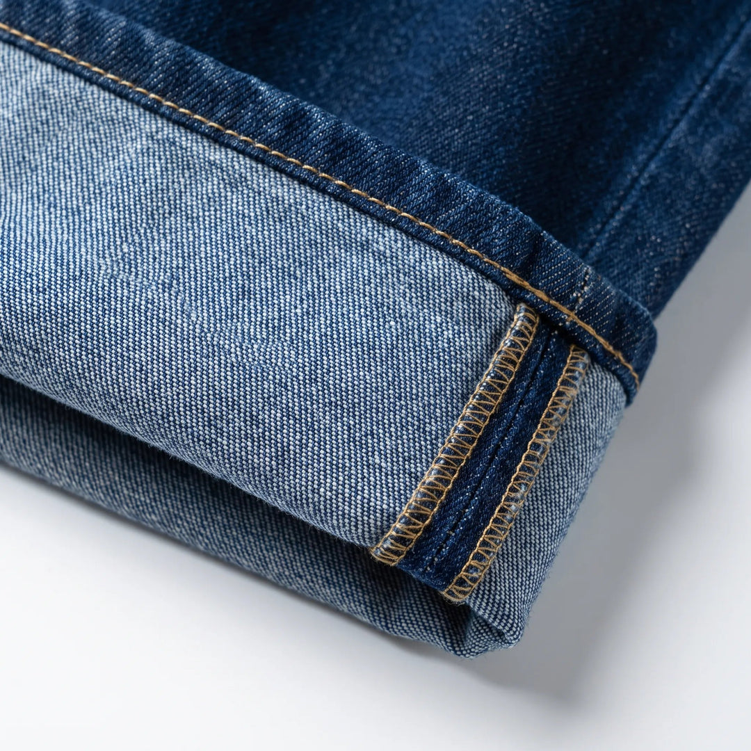 Women's dark blue high waist wide leg jeans with rolled cuffs