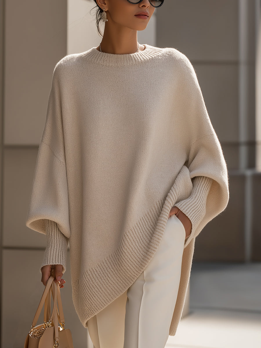 Women's oversized longline crew neck jumper with wide long sleeves and ribbed trims