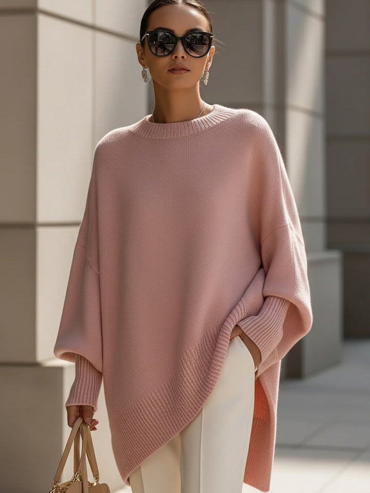 Women's oversized longline crew neck jumper with wide long sleeves and ribbed trims