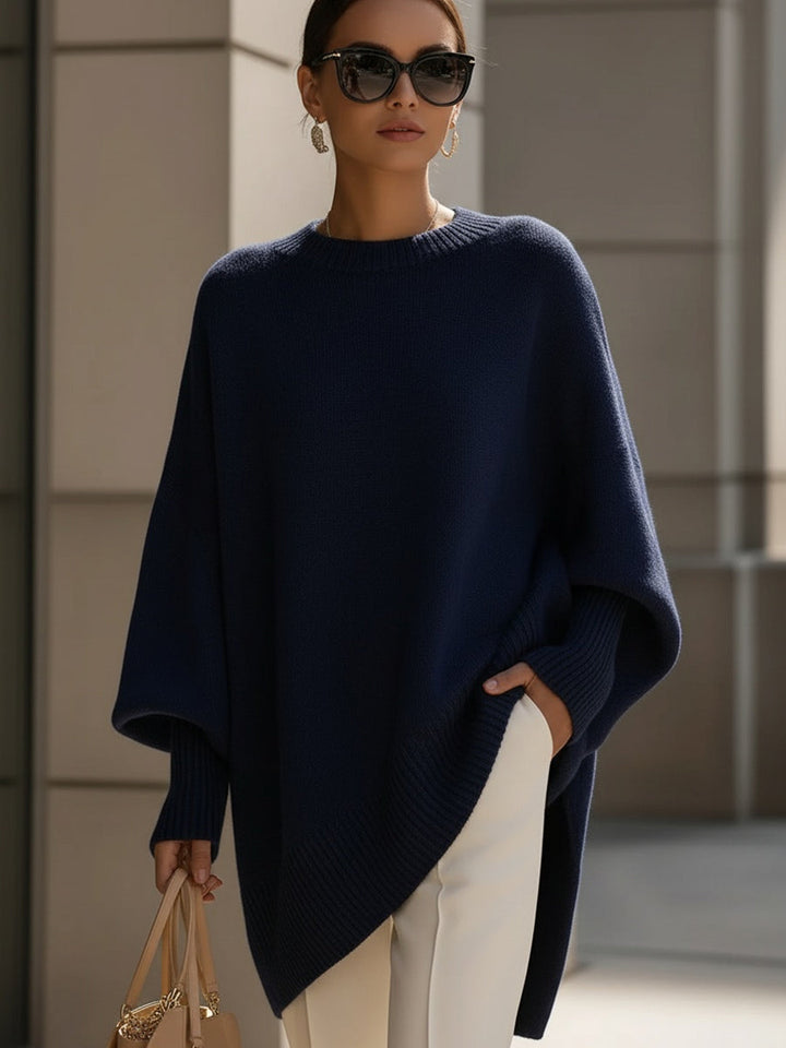 Women's oversized longline crew neck jumper with wide long sleeves and ribbed trims