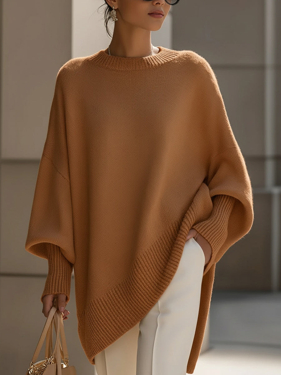 Women's oversized longline crew neck jumper with wide long sleeves and ribbed trims