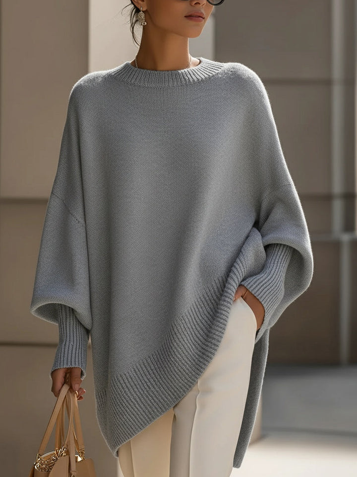 Women's oversized longline crew neck jumper with wide long sleeves and ribbed trims