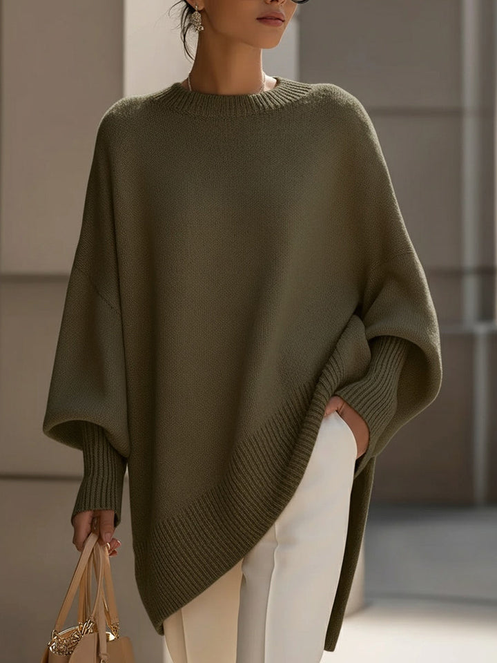 Women's oversized longline crew neck jumper with wide long sleeves and ribbed trims