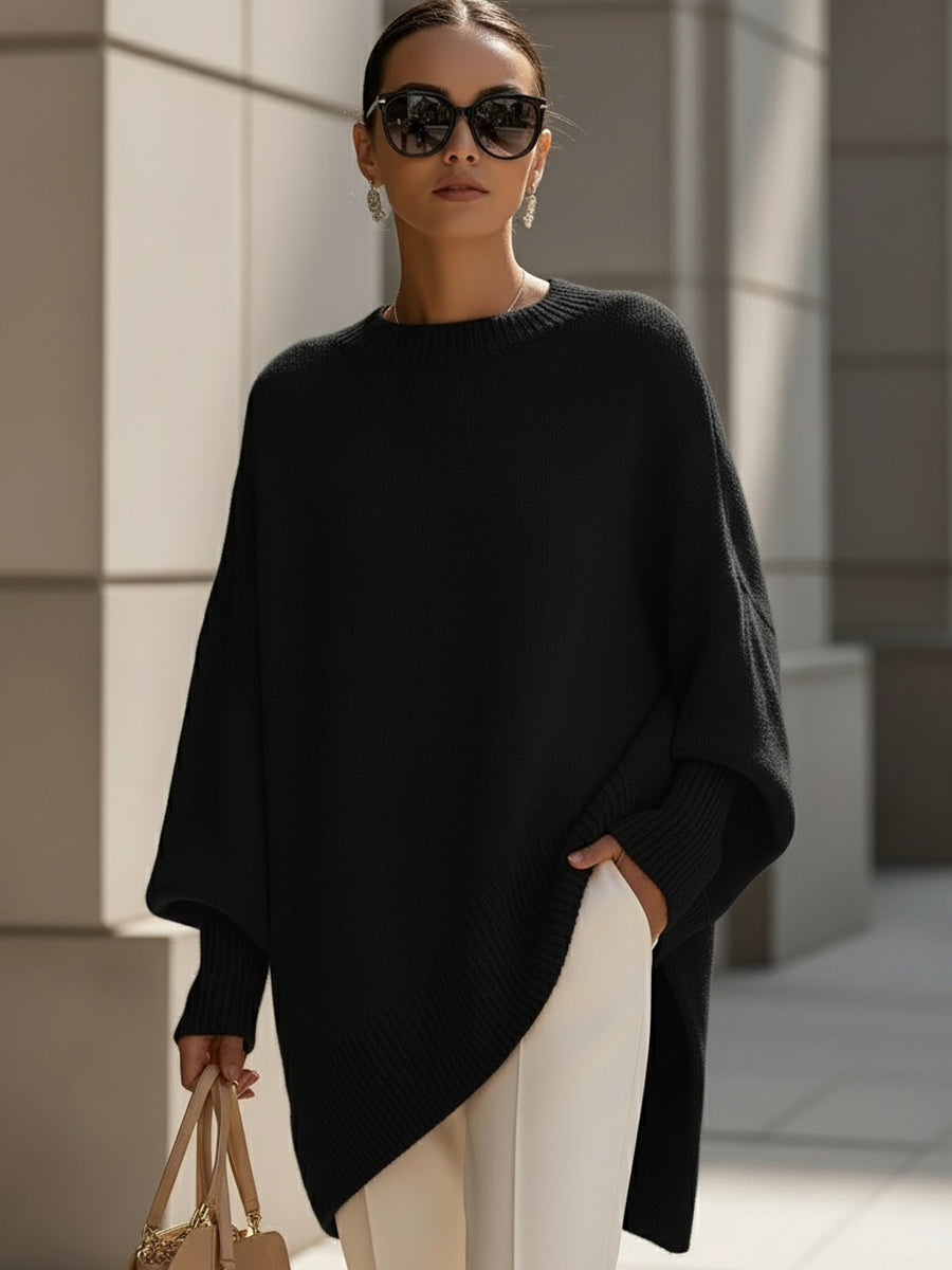 Women's oversized longline crew neck jumper with wide long sleeves and ribbed trims