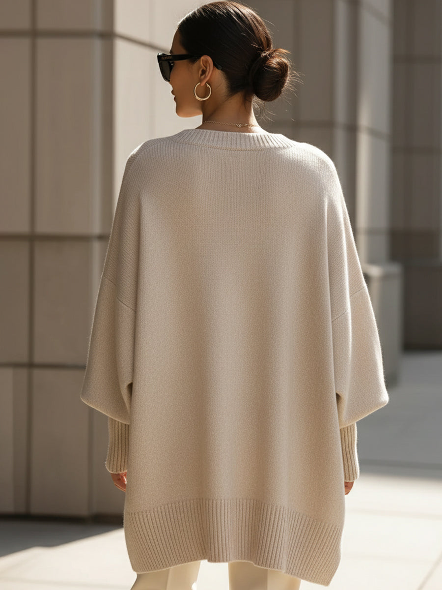 Women's oversized longline crew neck jumper with wide long sleeves and ribbed trims