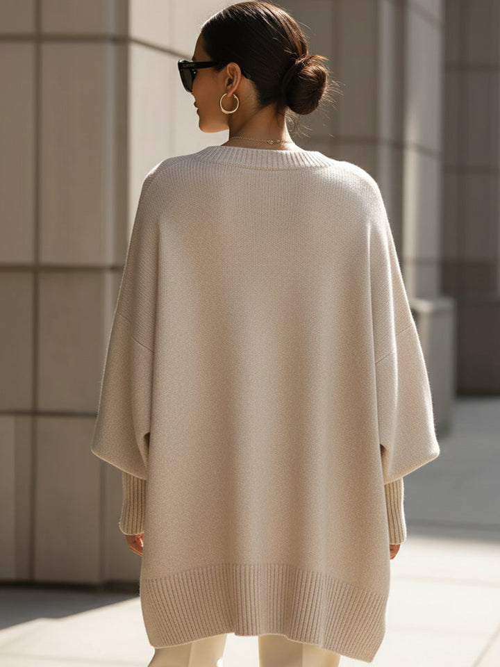 Women's oversized longline crew neck jumper with wide long sleeves and ribbed trims
