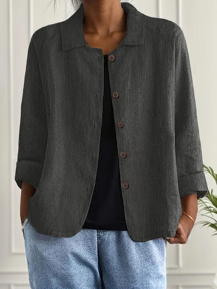 Women's collared button front shirt jacket with three-quarter sleeves