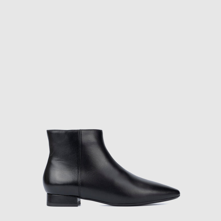 Women's black pointed toe ankle boots with side zips and low heels