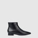 Women's black pointed toe ankle boots with side zips and low heels