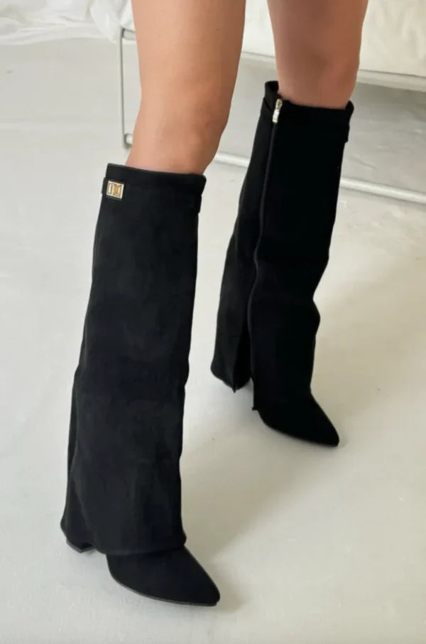 Women's knee high pointed toe boots with block heels and buckle straps