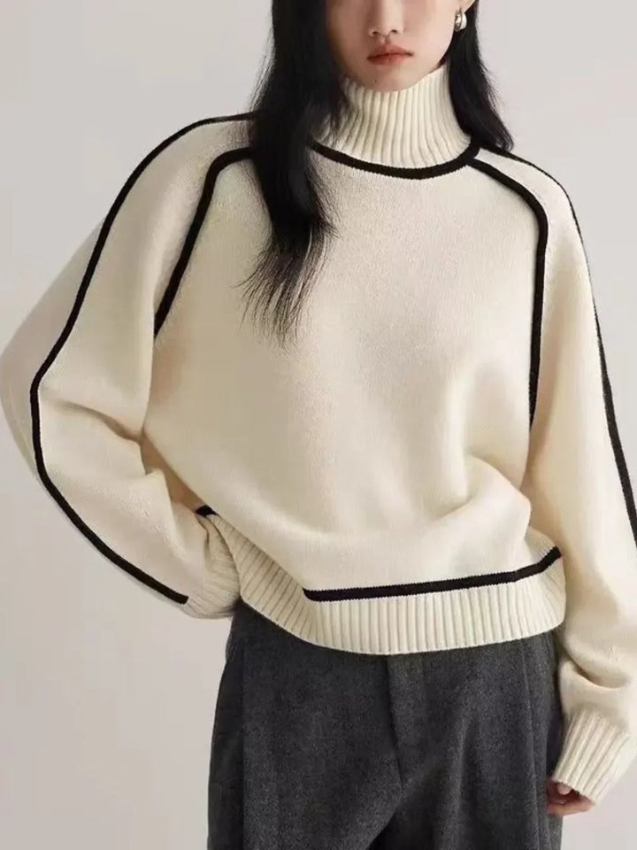 Women's oversized turtleneck jumper with contrast trim and long sleeves