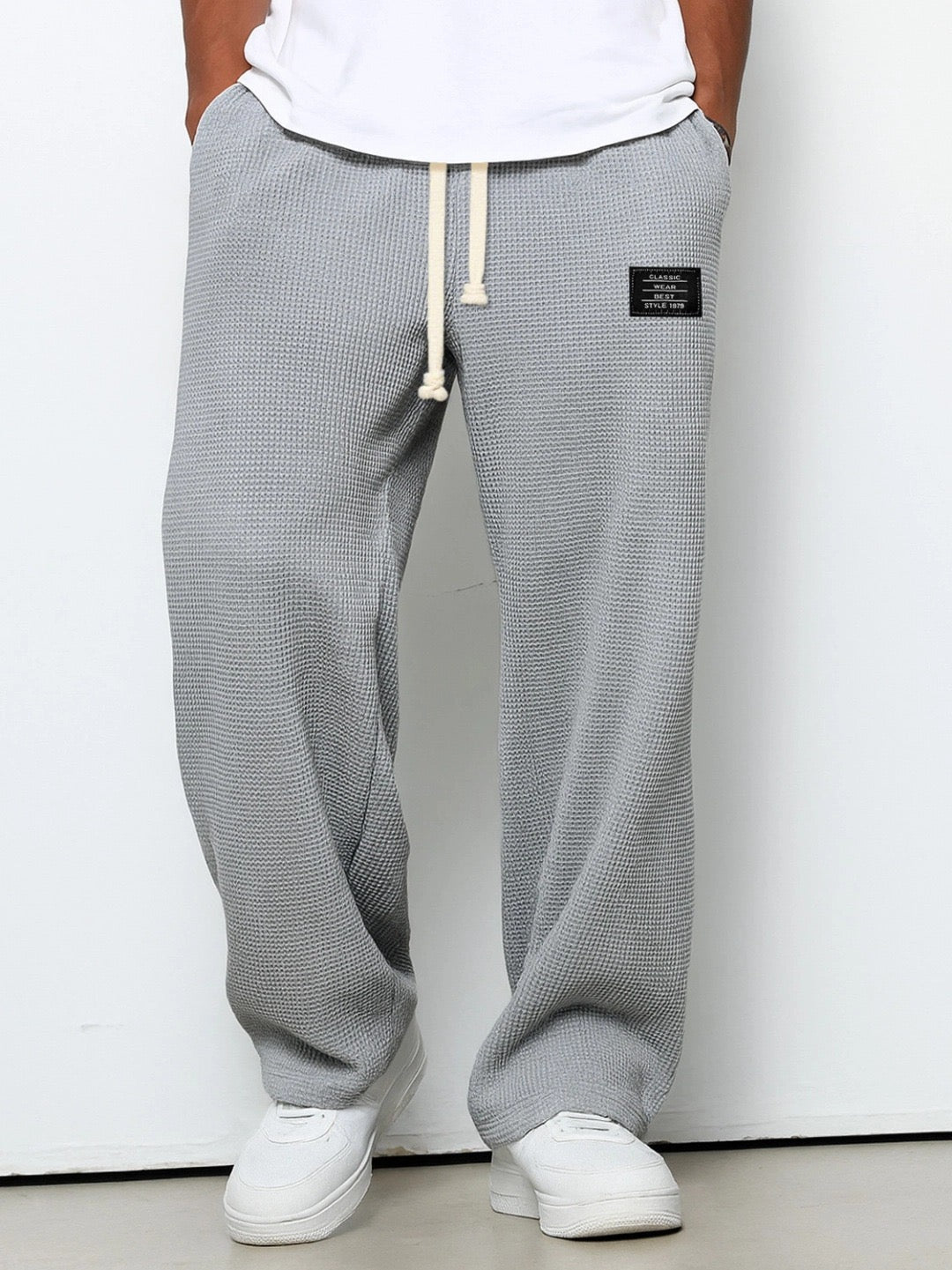 Men's wide-leg trousers with drawstring waist and textured finish