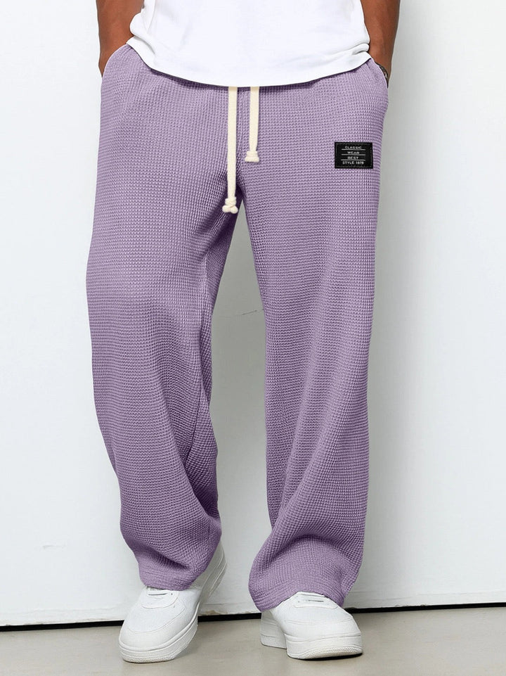 Men's wide-leg trousers with drawstring waist and textured finish