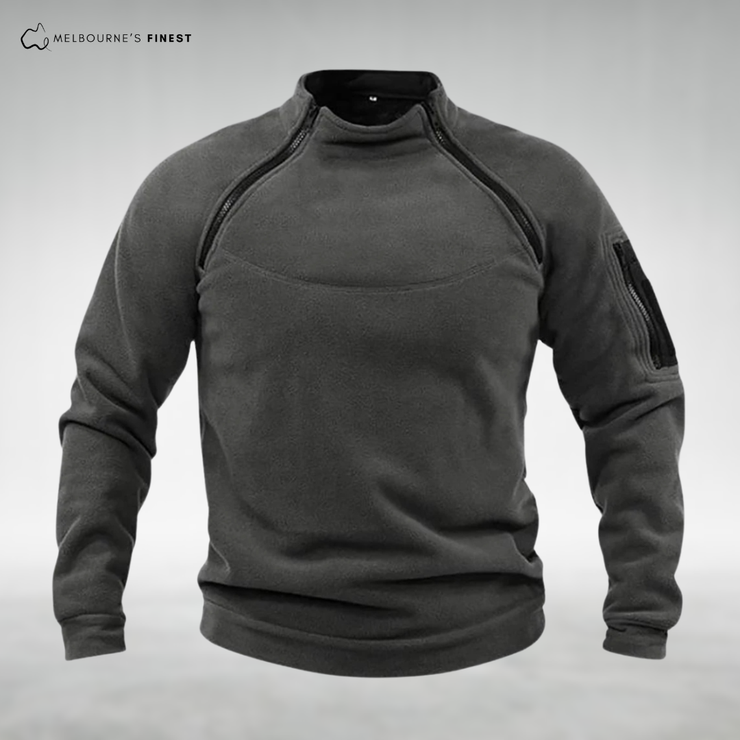 Men's high collar fleece pullover with chest and sleeve zip details