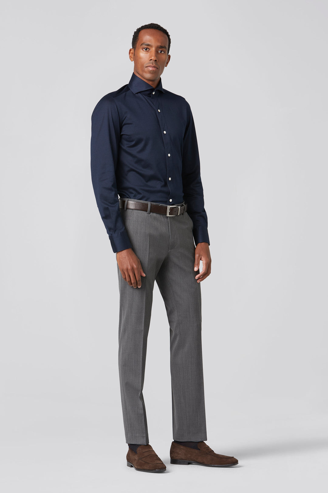 Men's tailored straight-leg trousers with flat front and defined creases