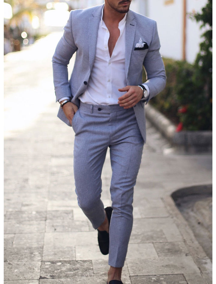 Men's tailored single breasted suit in navy blue and beige with white shirt
