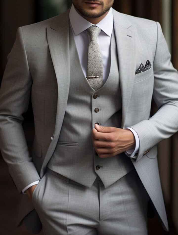 Men's tailored three-piece wedding suit with single breasted jacket, waistcoat and trousers