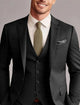 Men's tailored three-piece wedding suit with single breasted jacket, waistcoat and trousers