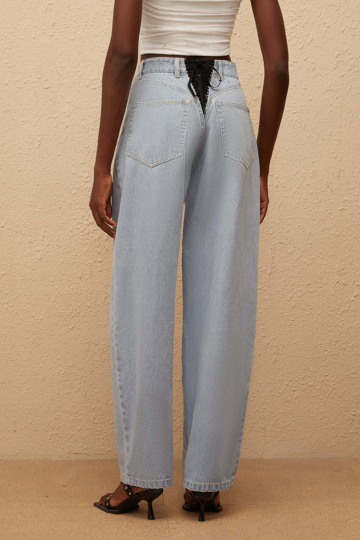 Women's light blue high-rise wide leg jeans with front and rear pockets