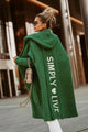Women's longline hooded knitted cardigan with vertical back text detail