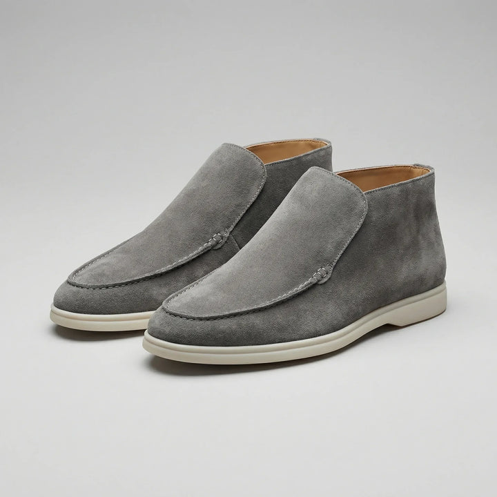 High-top loafer ankle boots with stitched vamp panels and flat light-coloured soles