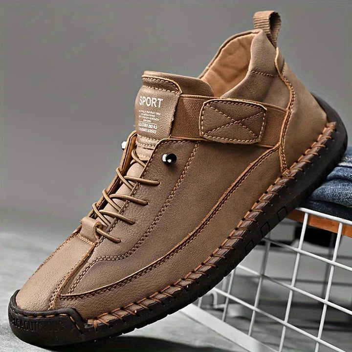 Women's lace-up sneakers with stitched panels and flat textured soles