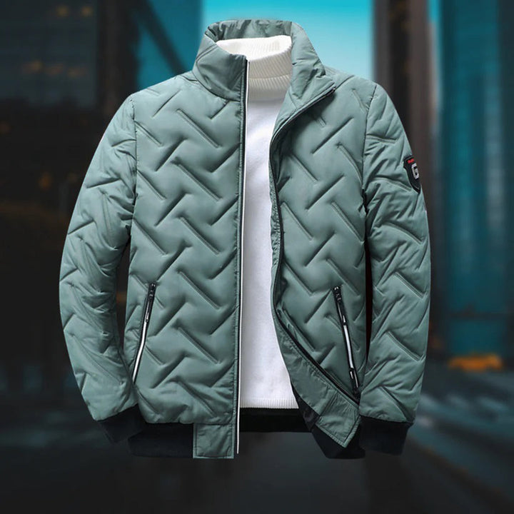 Men's quilted jacket with stand collar, geometric pattern and zipped pockets