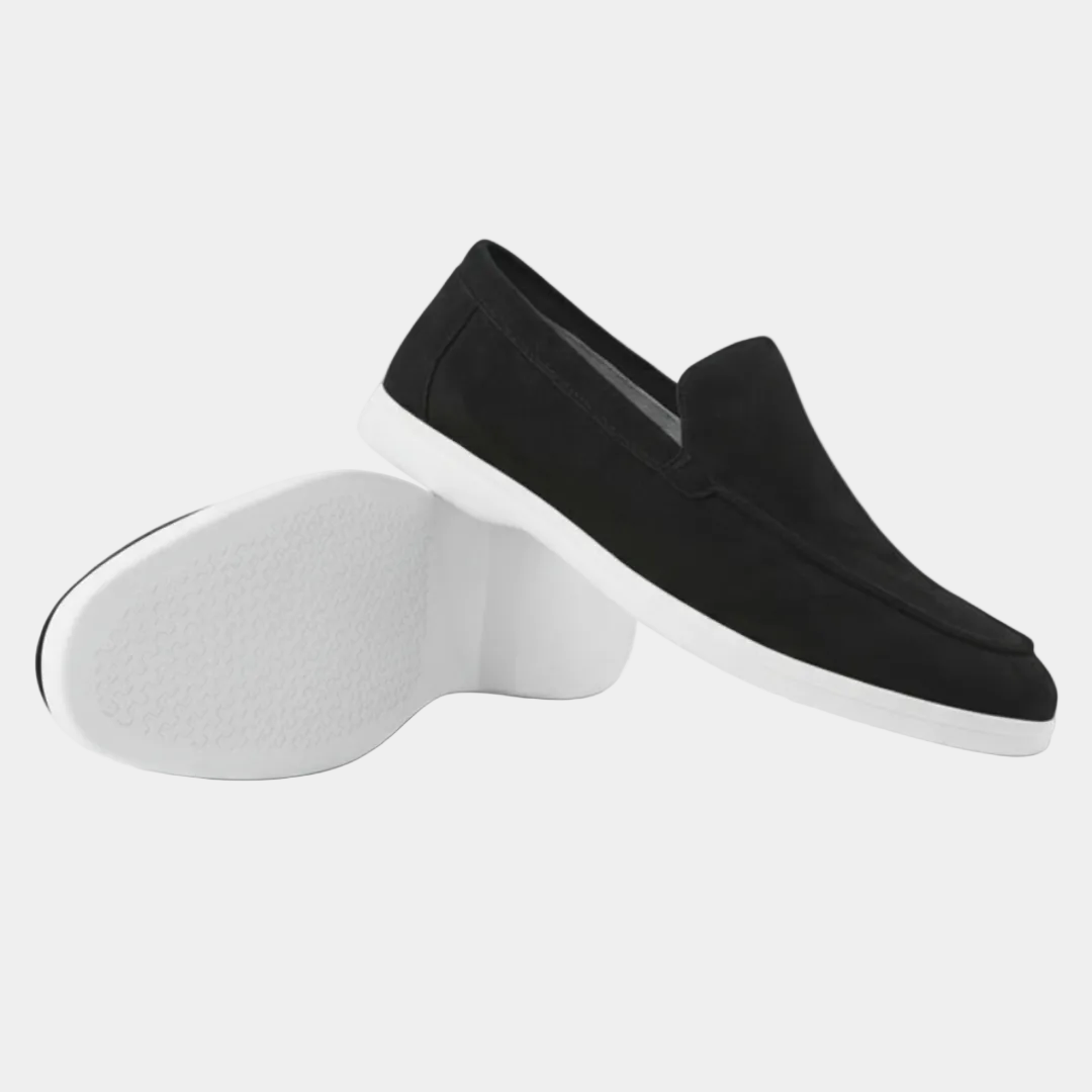 Men's slip-on loafers with visible stitching and white flat soles