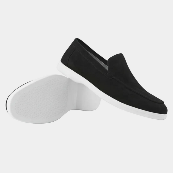 Men's slip-on loafers with visible stitching and white flat soles
