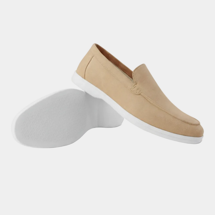 Men's slip-on loafers with visible stitching and white flat soles